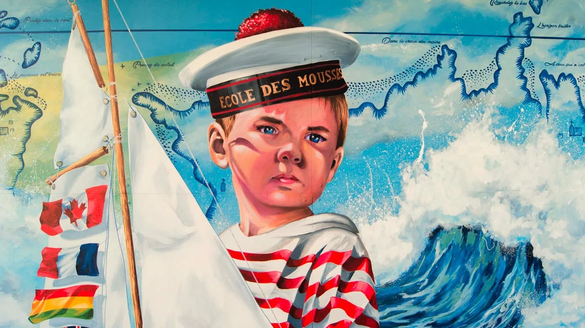 Fresque murale d'un jeune mousse breton devant une carte marine et un voilier, œuvre primée à l'International Mural Fest en Australie